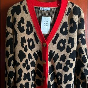 NWT women’s cardigan sweater cheetah print size xl fits like a large